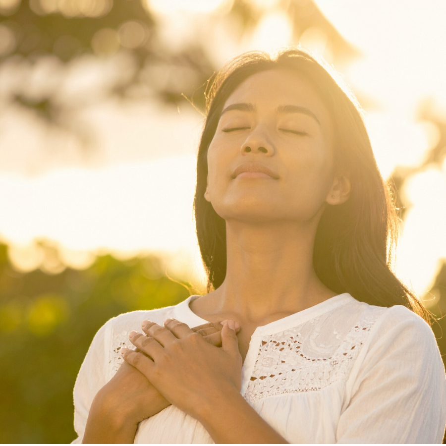 Woman practicing mindfulness in nature. 