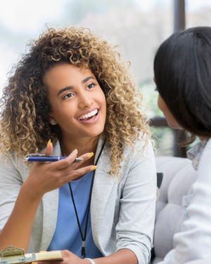 two women engaging in coversation, Anxiety Therapy orlando holistic mental health counseling